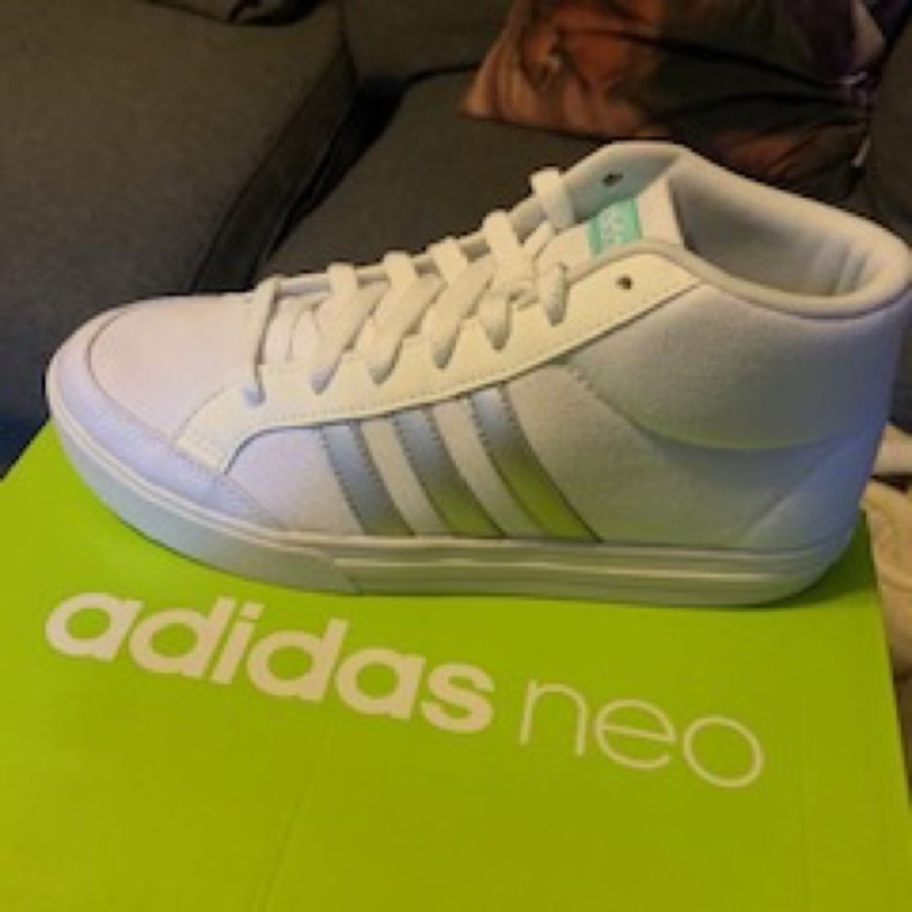 Adidas high tops. Never worn.